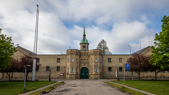 Vridsløselille State Prison in Albertslund near Copenhagen, Denmark, was built in 1859. It was closed down in 2018, and was put up for sale in 2019.\nThe most popular series of Danish movies ever, Olsen-banden - the Olsen gang - from 1968 to 1998 by Erik Balling, made the prison famous, as the main character, Egon Olsen, left the prison at the start of each movie, and returned to the prison again at the end. The street leading to the main entrance was named \
