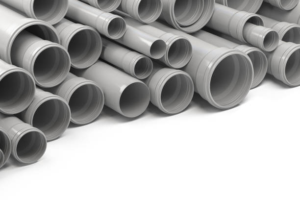 istock PVC plastic pipes and tubes stacked in warehouse. 1222564014