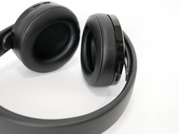 istock Black headphones on a white background 1222566325
