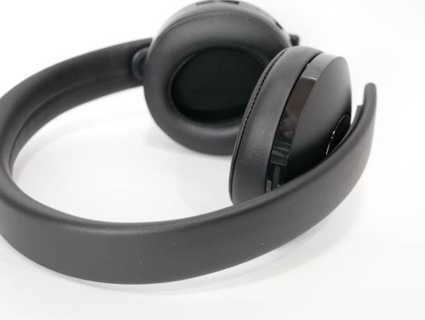 istock Black headphones on a white background 1222566335