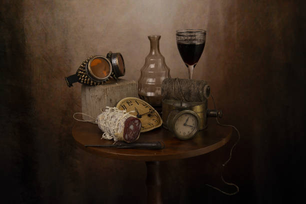 Objects on the table is an ancient vase of flowers, fruit, wine glass.The photo was taken using a light effect brush.