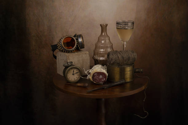 Objects on the table is an ancient vase of flowers, fruit, wine glass.The photo was taken using a light effect brush.