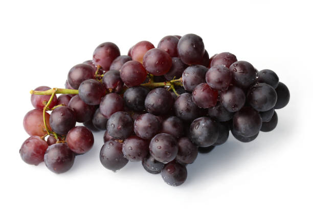 istock A branch of dark grapes on a white background 1222571103