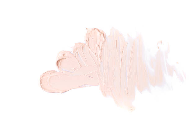 istock Lipstick smear smudge swatch isolated on white background. Cream makeup texture. 1222572324