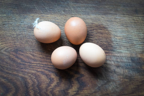 istock eggs on wooden table. natural food. 1222572529
