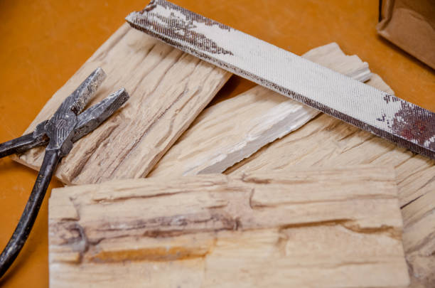 istock Decorative ceramic tiles, pliers, square, sandpaper close-up 1222574409