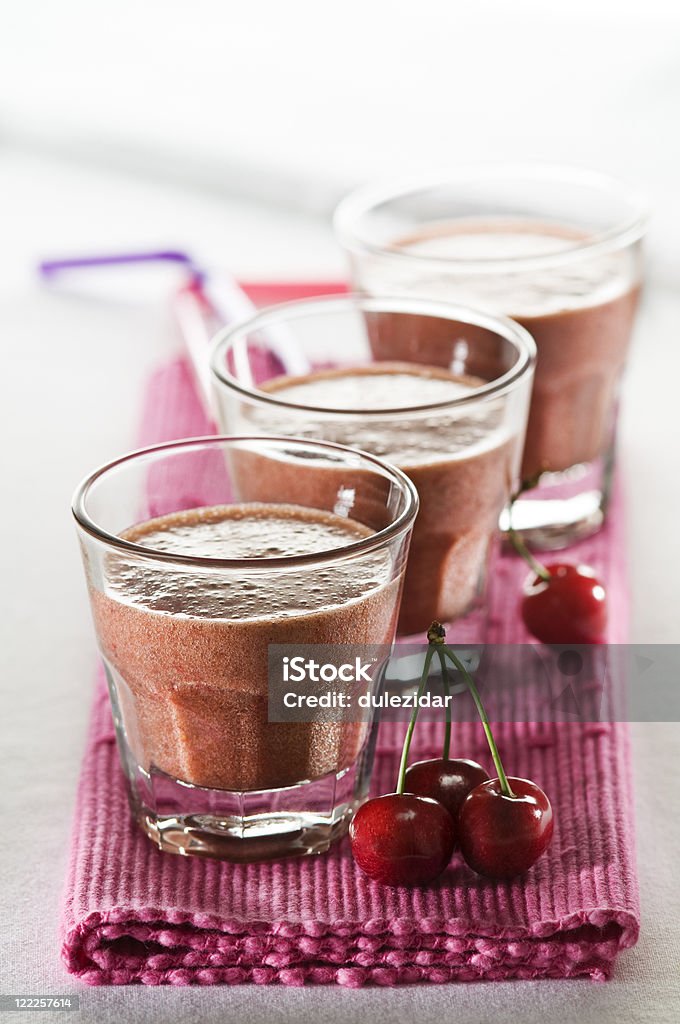 Cherry smoothie Cold cherry smoothie in glass close up Cherry Stock Photo