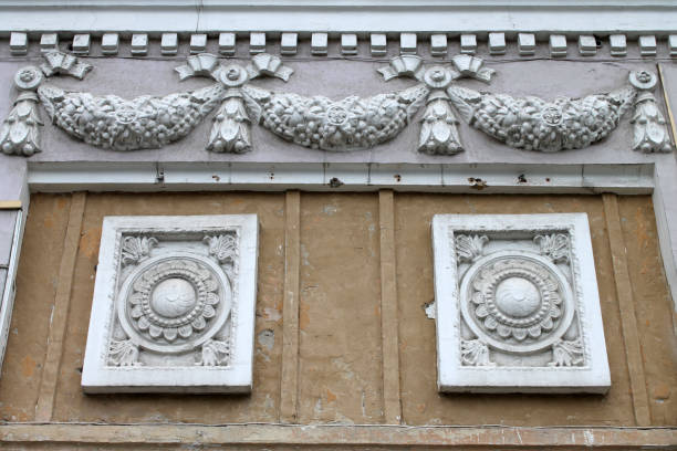 fragment of the old facade with stucco