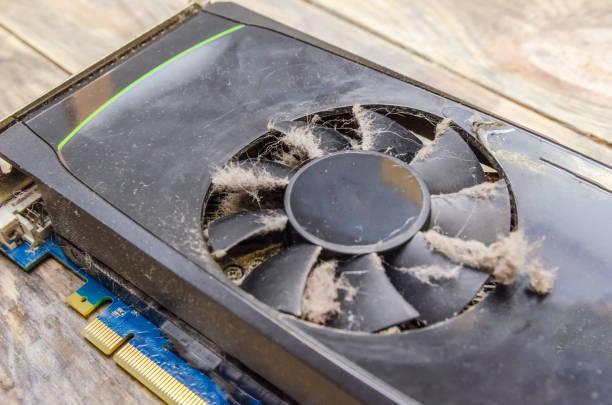 istock Dusty video card from a computer close up on a wooden background 1222578667