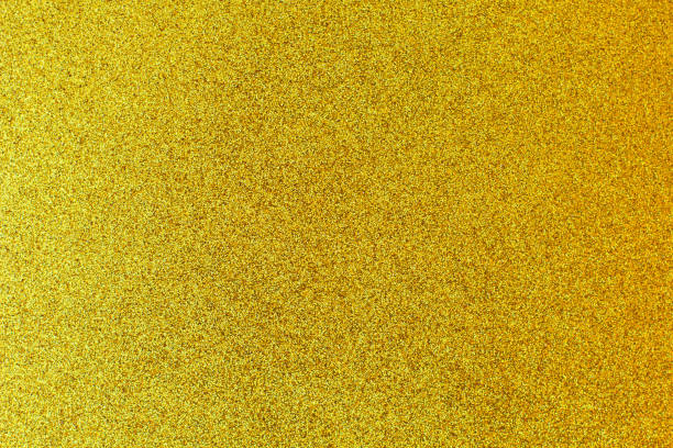 istock Defocused background of shining sparkles, abstract golden light. 1222578729