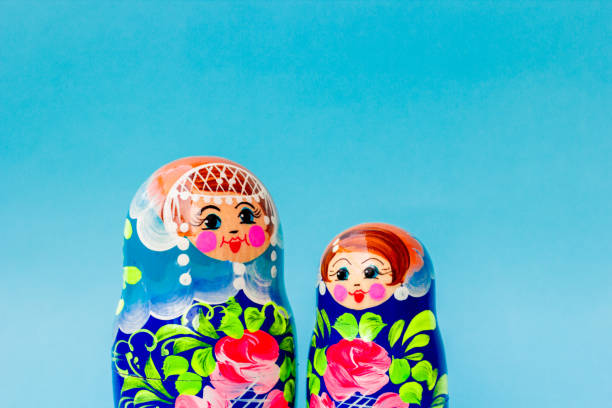 Blue matryoshka on a blue background, Slavic souvenir.
