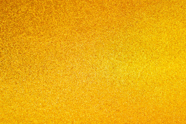 istock Defocused background of shining sparkles, abstract golden light. 1222578769