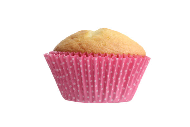 istock isolated cupcake in pink spotted paper cup 1222581120