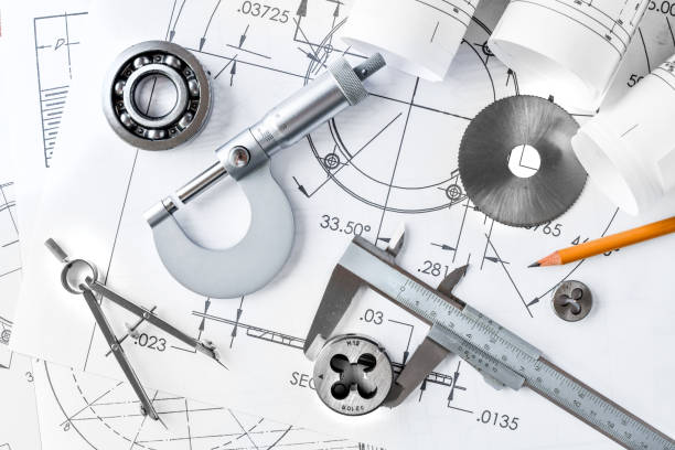 istock Engineer technicial drawings and  mechanical parts engineering industry work project paper prints. 1222581800