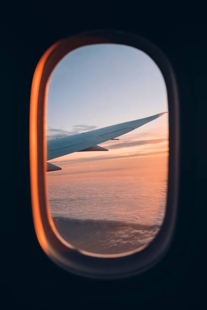 istock Beautiful sunset look through airplane window 1222582979