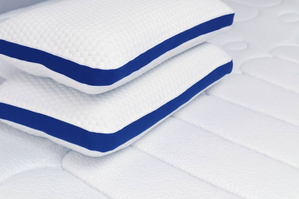 istock Orthopedic pillow on the quilted mattress. Comfortable bed for sleep and rest 1222584284
