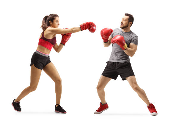 istock Young man and woman train boxing 1222586130