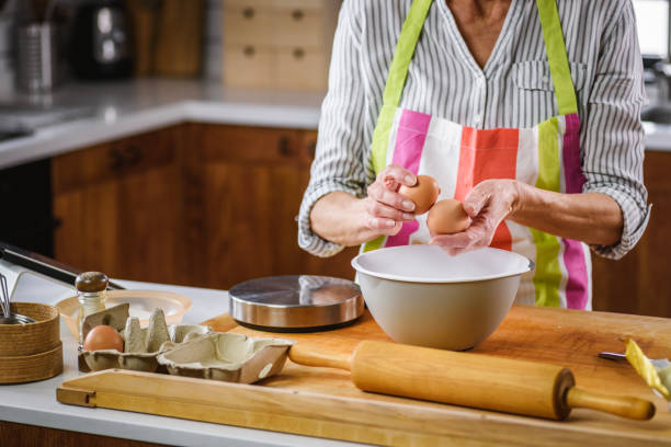 istock Elderly Woman Baking At Home 1222587050