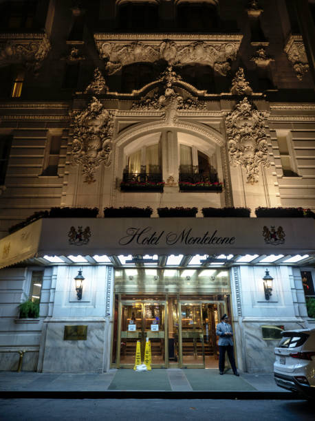 Hotel Monteleone facade New Orleans, Louisiana, USA - 2020: Facade of the famous Hotel Monteleone at night, located in the French Quarter district. door attendant photos stock pictures, royalty-free photos & images