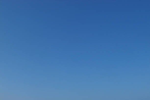 istock Clear blue sky with cloudless and soft light in the lower left corner 1222589238
