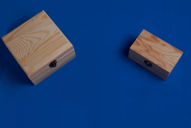 istock Wooden boxes over blue. Secrets and wishes 1222593500