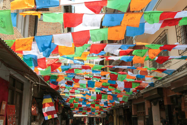 istock Buddhist prayer flags waves above street in Kathmandu 1222593593
