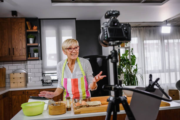 istock Older woman vlogging on her food channel 1222593608