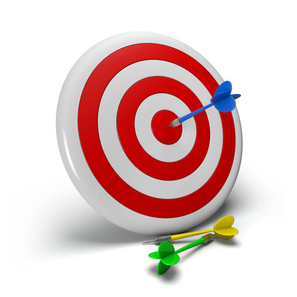 istock dartboard on wall, dart in target red circle center 1222594659