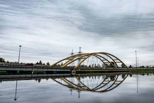 The Ring Road runs around St. Petersburg. On her way she crosses several rivers. One of them is the Okhta River.