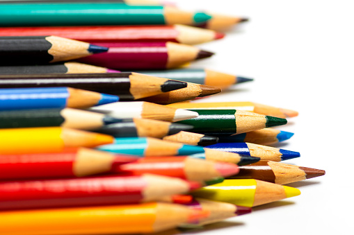 Colour pencils isolated on white background close up