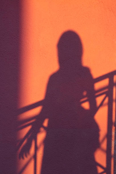 istock A girl's shadow on wall in Burano 1222597187