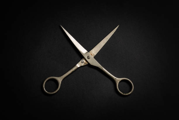 istock Nice old aluminum comb and steel scissors barber work instruments isolated 1222598151