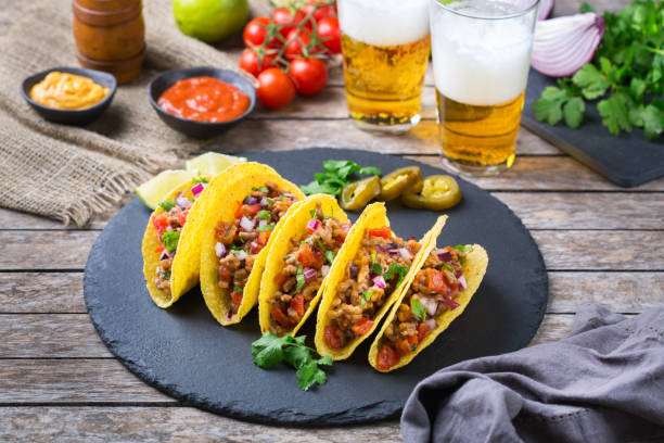 istock Taco shell nachos with beef, guacamole, chili, cheese salsa, tequila 1222598267