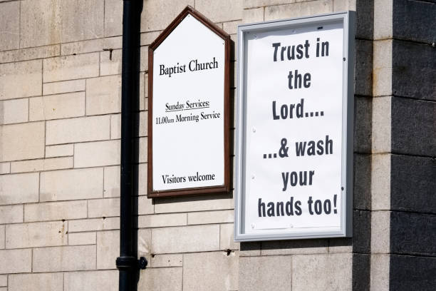 istock Wash hands message on religious church sign 1222598838