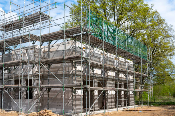 istock Shell with scaffolding, construction of a semi-detached house 1222598989