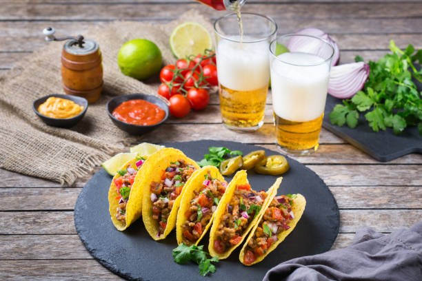istock Taco shell nachos with beef, guacamole, chili, cheese salsa, tequila 1222599160