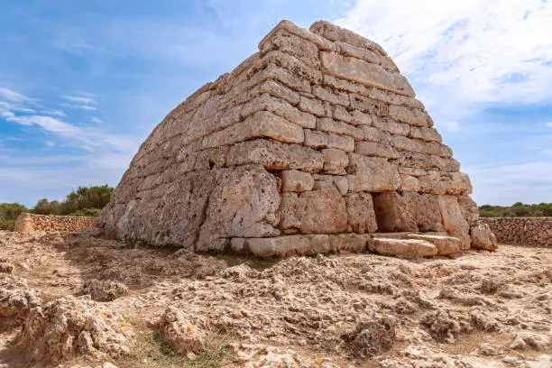 View of La Naveta des Tudons - the most famous of Menorca"u2019s megalithic sites.