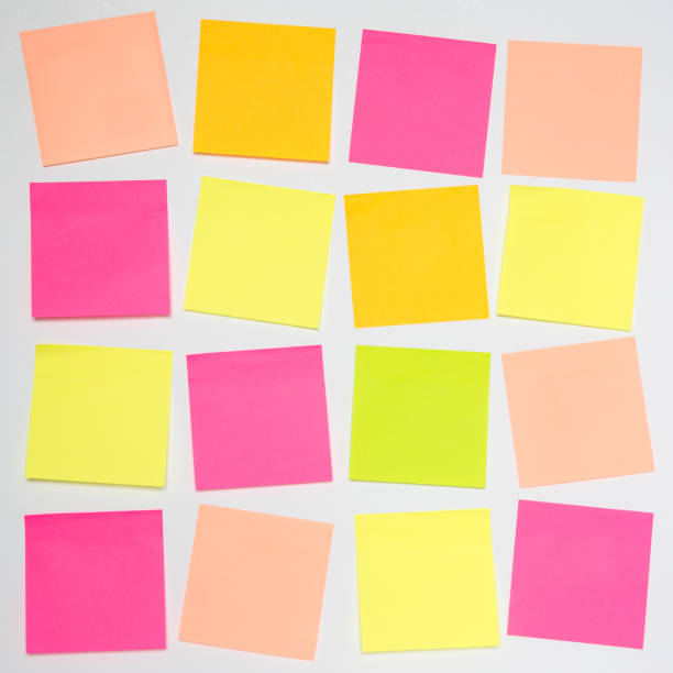 istock Rows of blank Sticky Notes or colorful Adhesive notes arranged in a four square grid pattern with copy space 1222599376