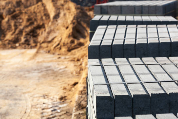 istock Piled concrete curbstones. Construction material for road construction works 1222600771