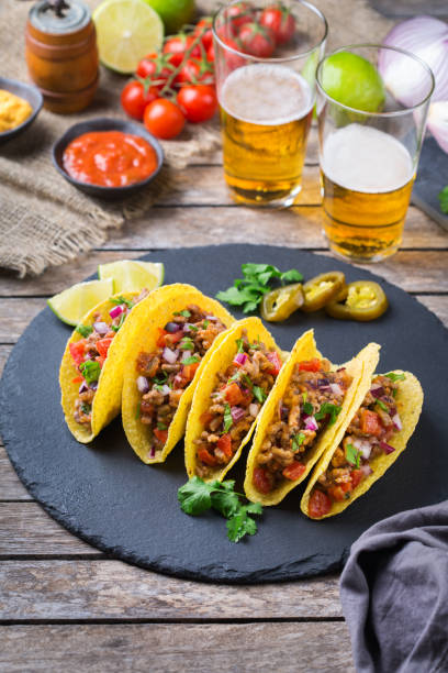 istock Taco shell nachos with beef, guacamole, chili, cheese salsa, tequila 1222601045