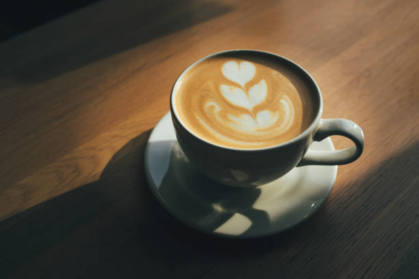 istock Cup of cappuccino on wooden table. 1222601744