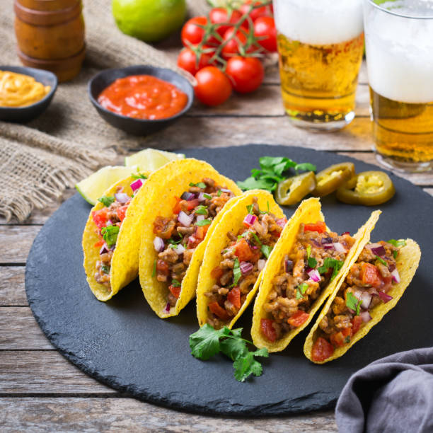 istock Taco shell nachos with beef, guacamole, chili, cheese salsa, tequila 1222602163