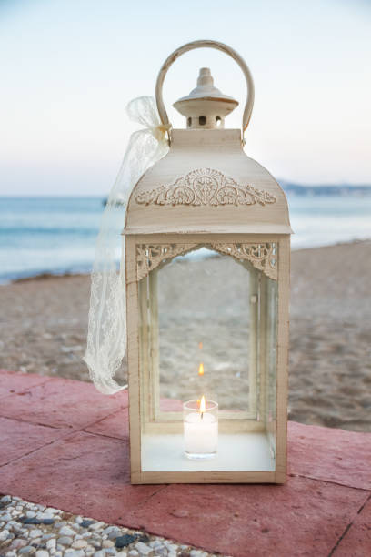 istock Hurricane lantern with a burning candle 1222604574