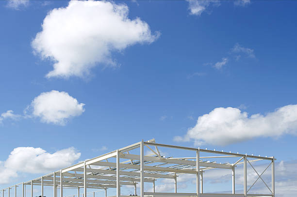 istock Structural Steelwork For Supermarket Building Against Blue Sky 122260572