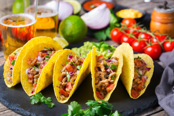 istock Taco shell nachos with beef, guacamole, chili, cheese salsa, tequila 1222607523