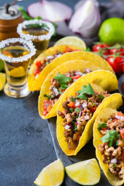 istock Taco shell nachos with beef, guacamole, chili, cheese salsa, tequila 1222607639