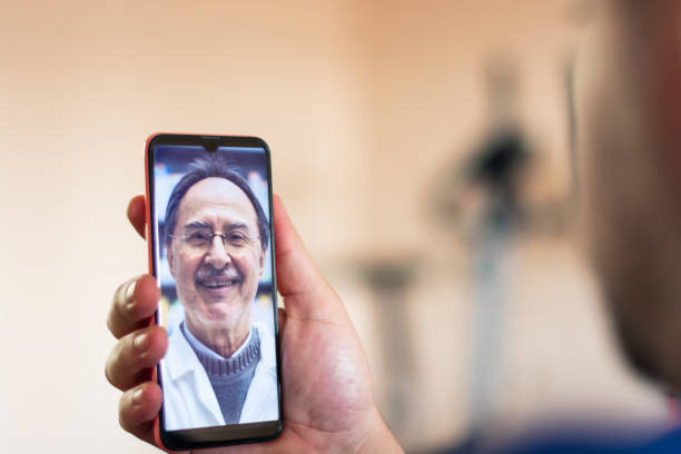 istock Patient talking to a doctor online through a mobile phone 1222609152