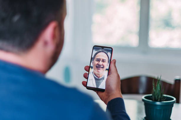 istock Patient talking to a doctor online through a mobile phone 1222609272