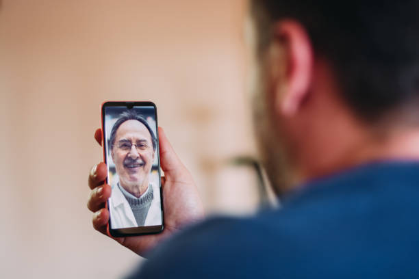 istock Patient talking to a doctor online through a mobile phone 1222609429