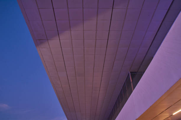 istock Modernist building roof in blue sky 1222612144